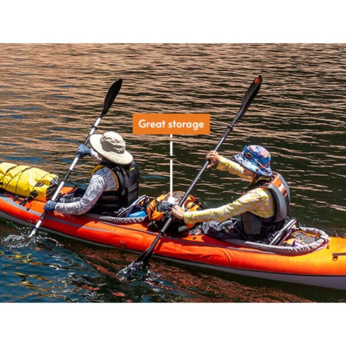 Two paddlers kayaking with gear in AdvancedFrame Convertible kayak with great storage