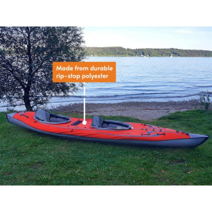 AdvancedFrame Convertible kayak on grass near lake made from rip-stop polyester
