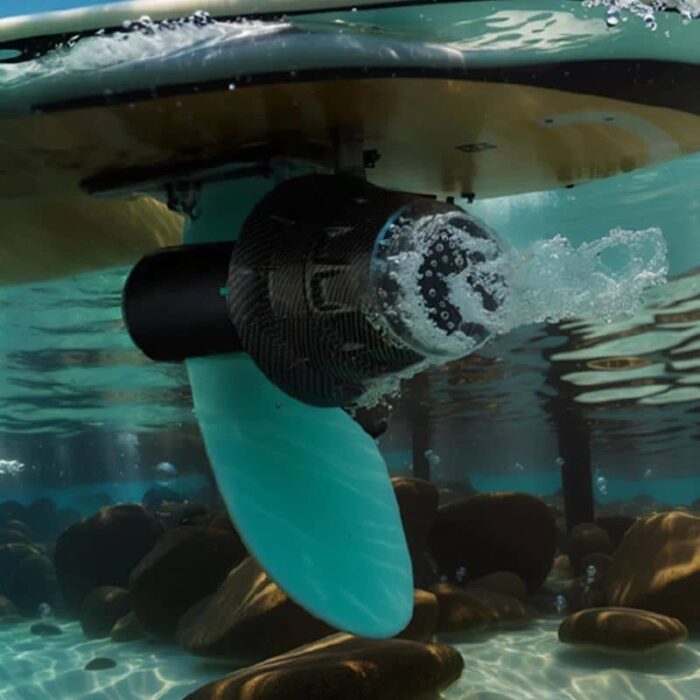 Asiwo U1 diver propulsion vehicle attached to stand-up paddleboard on clear tropical water