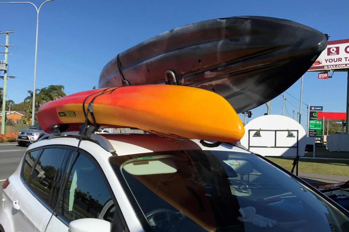 How can I transport 2 or more kayaks?