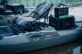 Close-up of Bonafide PWR129 seat, battery box, and side electronics rigging.