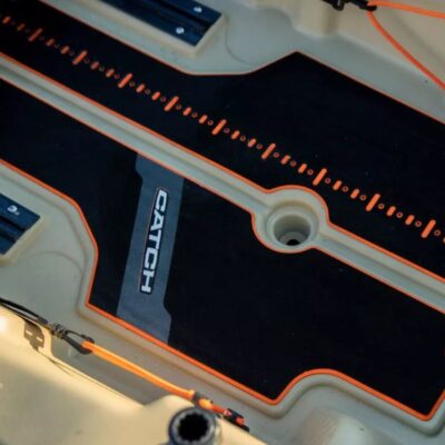 Close-up of the traction pads on the deck of the Pelican Catch PWR 100 for standing stability