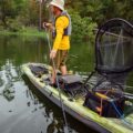 Standing fishing on Pelican Catch 110 Mode kayak