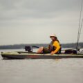Pelican Catch 110 Mode fishing kayak paddling on calm water