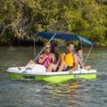 Pelican Monaco DLX Angler pedal boat with canopy on a lake