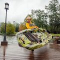 Pelican Catch 110 Mode kayak being carried using side handle