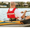 Kayaker wearing Palm Meander Highback PFD seated comfortably against kayak seat